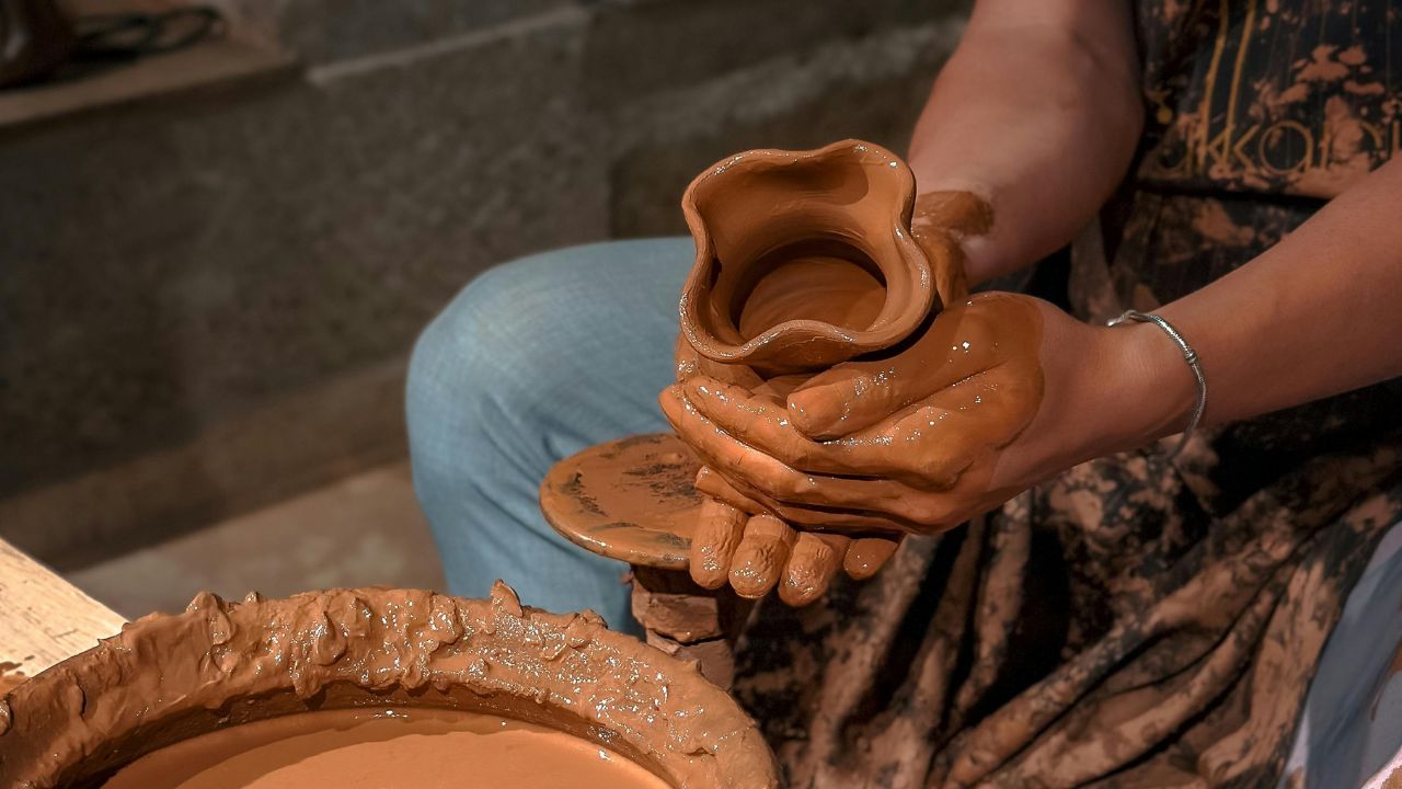 Hands shaping clay at a traditional Hoi An pottery workshop - La siesta hoi an resort and spa - hoi an vietnam (2)