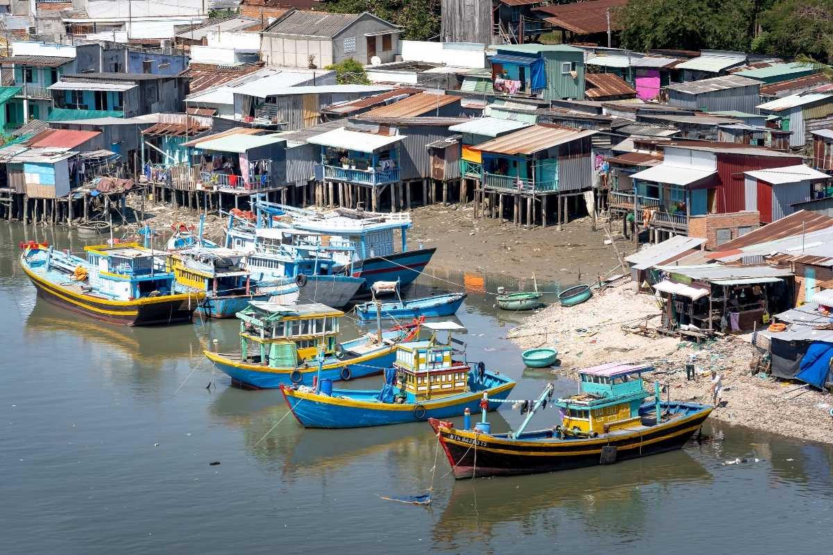 Fishing Boats and Village in hoi an